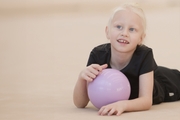 Young gymnast during training