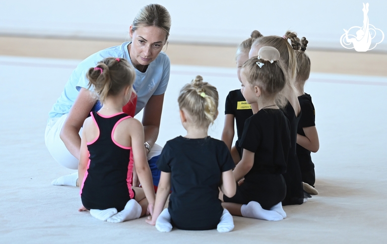 Academy coach Anna Ustsova with girls during a choreography lesson