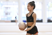 A gymnast from China during the workout