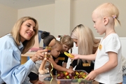 Teachers hold lesson for preschoolers in the Academy classroom