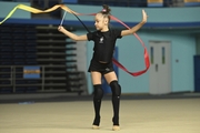 Ksenia Savinova during an exercise with a ribbon at floor testing