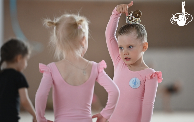 Young gymnasts during training