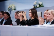 Olympic champion Alina Kabaeva watches the performances of the participants together with the judges