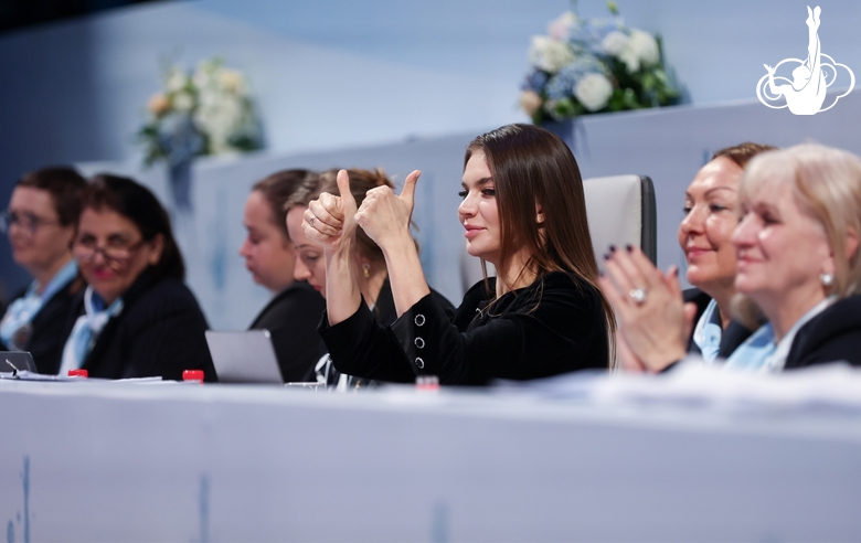 Olympic champion Alina Kabaeva watches the performances of the participants together with the judges