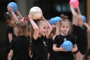 Young gymnasts during rehearsal of the competition opening