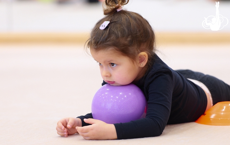 Young gymnasts during training