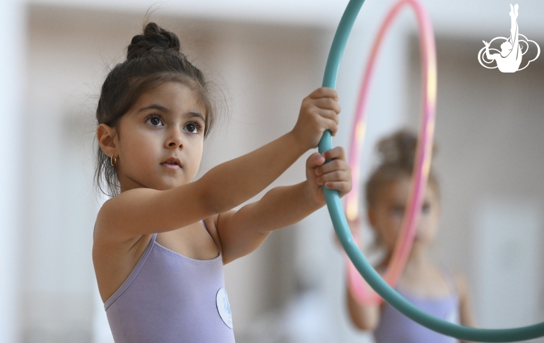 Young gymnast during training