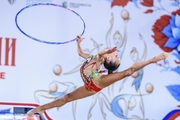 Ksenia Savinova performs the spilt leap with the hoop