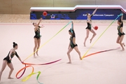 Gymnasts during an exercise with balls and ribbons