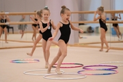 Young gymnasts during training