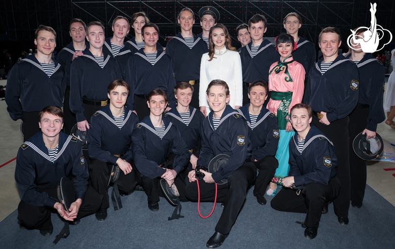 Olympic champion Alina Kabaeva on a group photograph with the Igor Moiseyev State Academic Folk Dance Ensemble