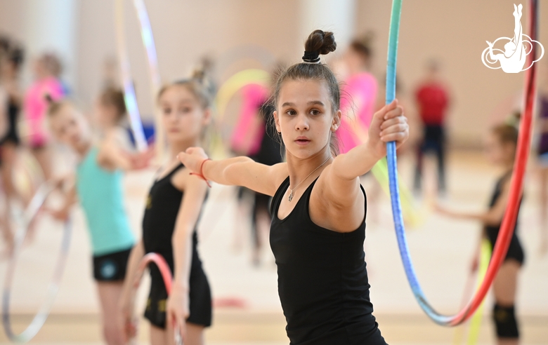 Gymnast during an exercise with a hoop during training