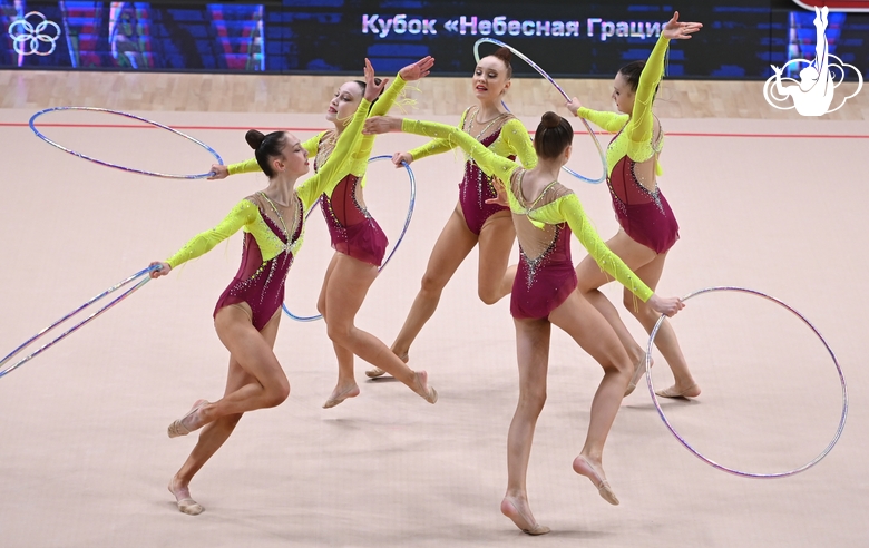 Gymnasts during an exercise with hoops