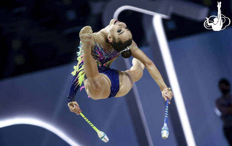 Szofia Bernat (Hungary) during an exercise with clubs