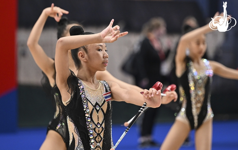 Gymnasts perform exercises with hoops during floor testing before the BRICS Games