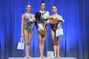 Natalia Usova,  Alina Harnasko and Mariia Borisova at the awards ceremony