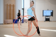 Gymnast performing an exercise with hoops