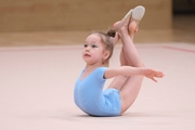 Young gymnast during the workout