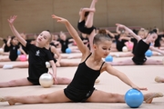 Young gymnasts during rehearsal of the competition opening