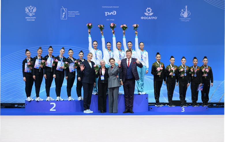 March 15, 2026. Olympic champion Alina Kabaeva, TV presenter Dmitry Guberniev, and two-time Olympic bronze medalist in basketball Natalia Vodopyanova and coach Elena Petunina with the medalists of the Alina Kabaeva Grand Prix Champions Cup