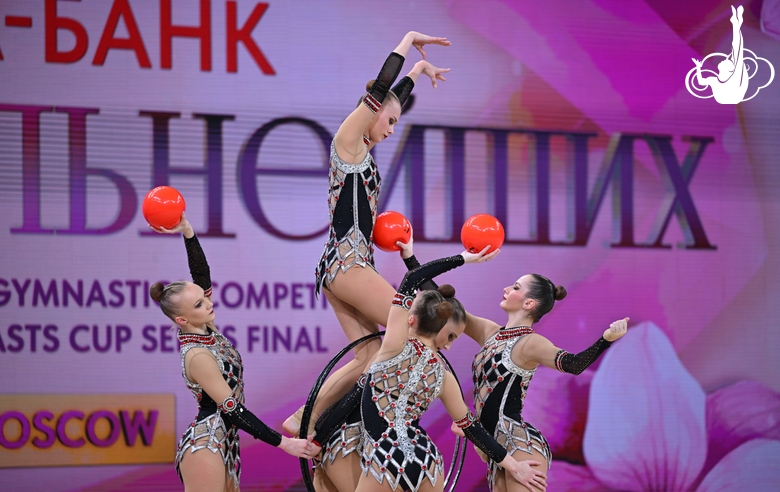 Group team gymnasts from the Russian national team during an exercise with balls and hoops