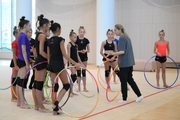 Gymnasts and coach Oksana Skaldina during the recovery camp at the Academy