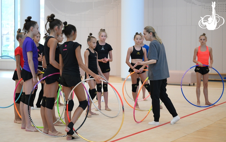 Gymnasts and coach Oksana Skaldina during the recovery camp at the Academy