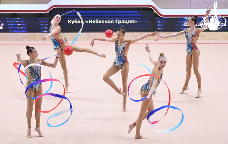 Gymnasts during an exercise with balls and ribbons