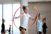 A gymnast during practice at the training camp in the Academy