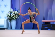 Полина Семенова во время выполнения упражнения с обручем на всероссийском турнире «Кубок "Небесная грация"»