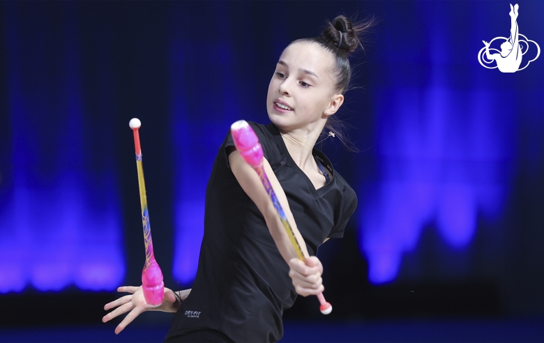 Marria Borisova during an exercise with clubs at floor testing