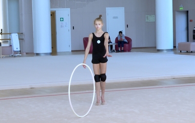 Kristina Voitenko continues to prepare her hoop routine under the guidance of coach Irina Dzyuba