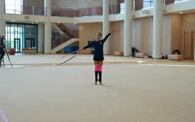 Ksenia Savinova worked on the risk and fouettés in her hoop routine