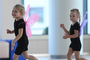 Young gymnasts during training