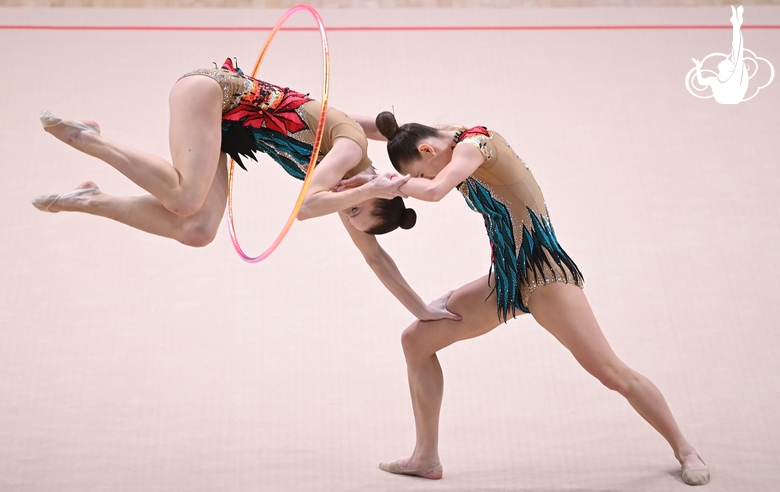 Gymnasts during an exercise with hoops