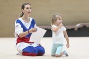 Academy Coach Olga Frolova with a young gymnast during the selection