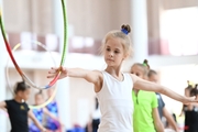 Gymnast from the Amur Tiger society during an exercise with a hoop