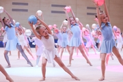 Young gymnasts performing at the opening ceremony of the all-Russian Sky Grace Cup competition