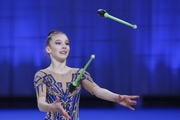 Milana Parfilova during an exercise with clubs