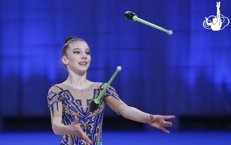 Milana Parfilova during an exercise with clubs