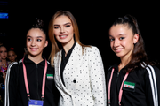The Olympic champion with gymnasts from Syria at the international Alina Kabaeva Grand Prix Champions Cup tournament in St. Petersburg