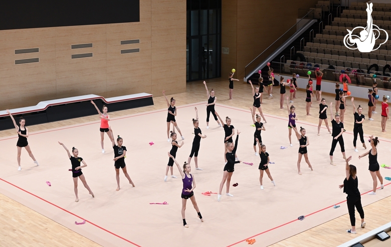 Gymnasts exercise in the performance hall