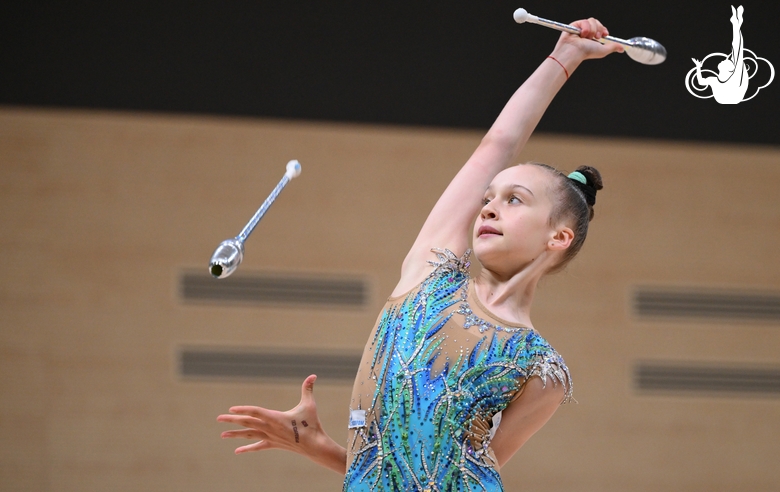 Miroslava Monina during an exercise with clubs during a control training session