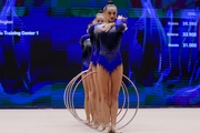 Gymnasts during an exercise with hoops