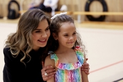 Olympic champion Alina Kabaeva with a young gymnast  at the Sky Grace Grand Prix tournament