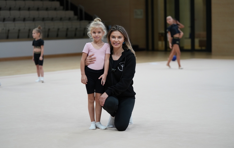 September 6, 2024. Olympic champion Alina Kabaeva with a young gymnast during the selection process