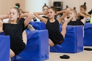 Academy students stretching before training