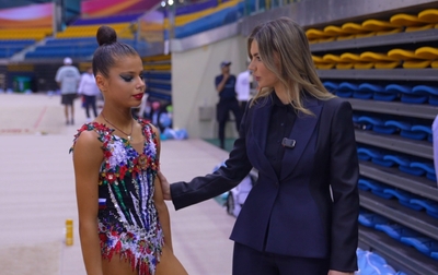 Alina Kabaeva supports Karolina Tarasova after unsuccessful clubs routine at the Sky Grace Cup