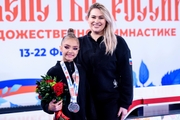 Academy coach Evgenia Eliseeva and Ksenia Savinova at the award ceremony