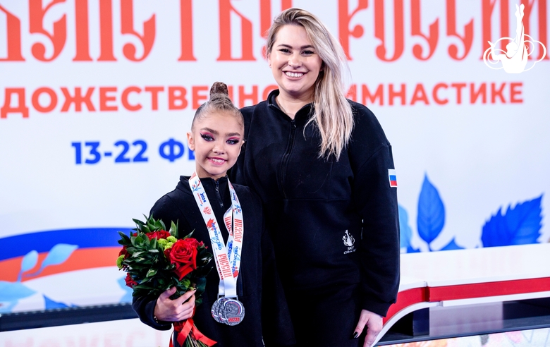 Academy coach Evgenia Eliseeva and Ksenia Savinova at the award ceremony